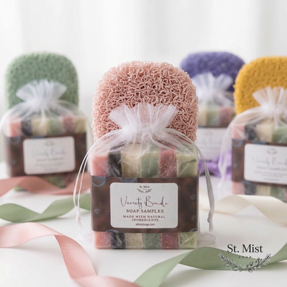 St. Mist Soap mini soap sampler bundle with assorted natural soap pieces and a pink bioplastic soap saver pad